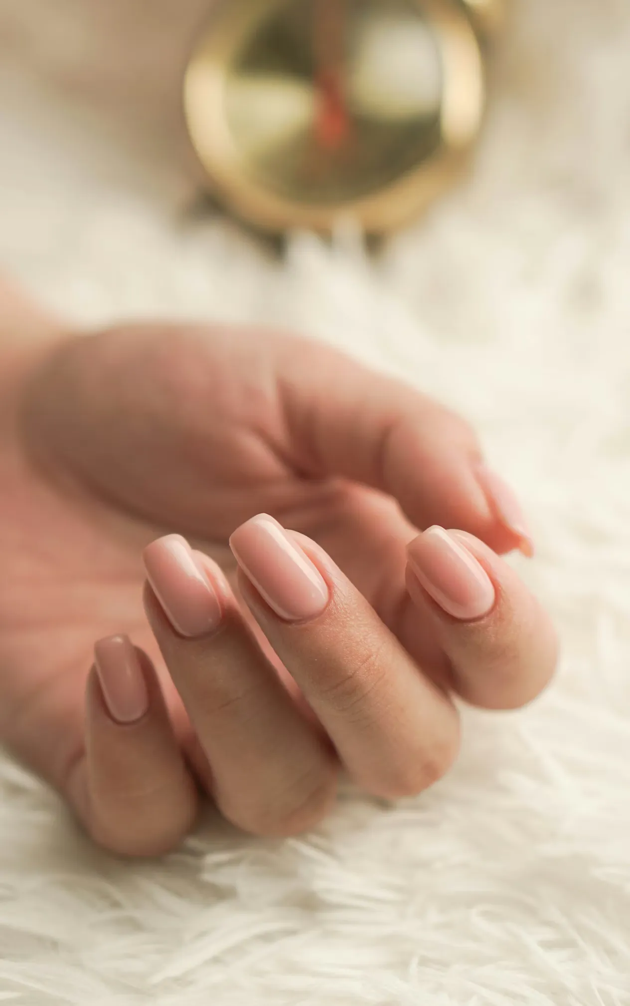 Pedicure on white textile